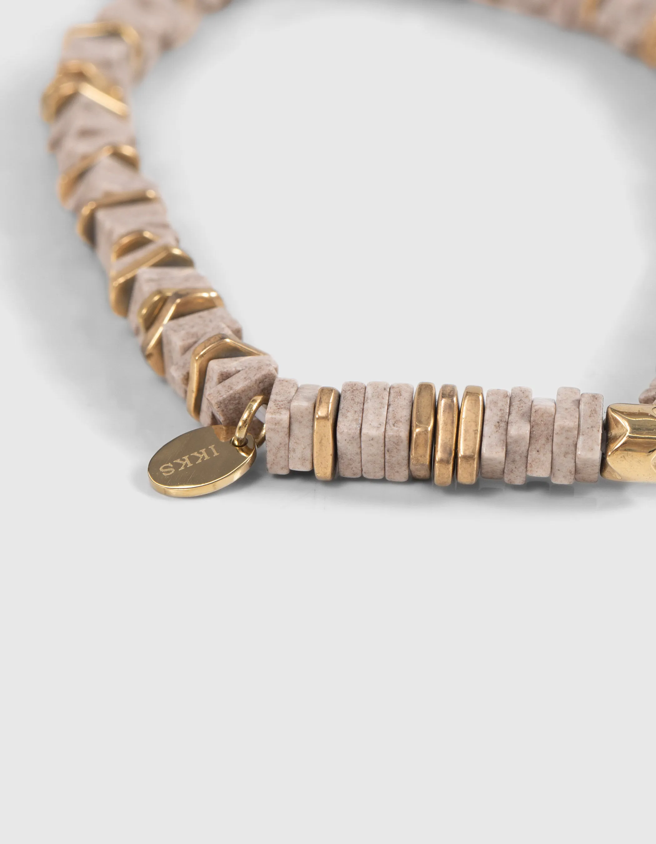 Bracelets perles craie et dorées Femme